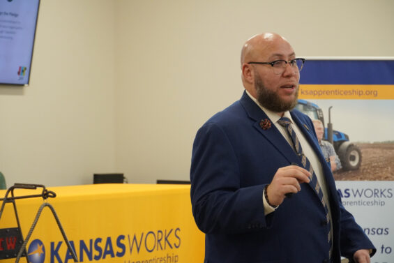 A representative from KansasWorks leads an employment seminar for job seekers looking to start a career in Kansas.