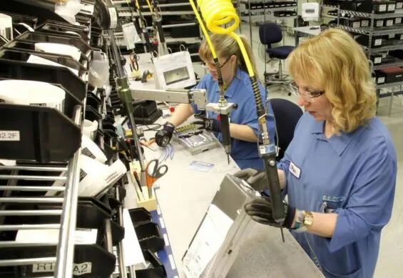 Two Garmin employees work in a lab in Kansas.